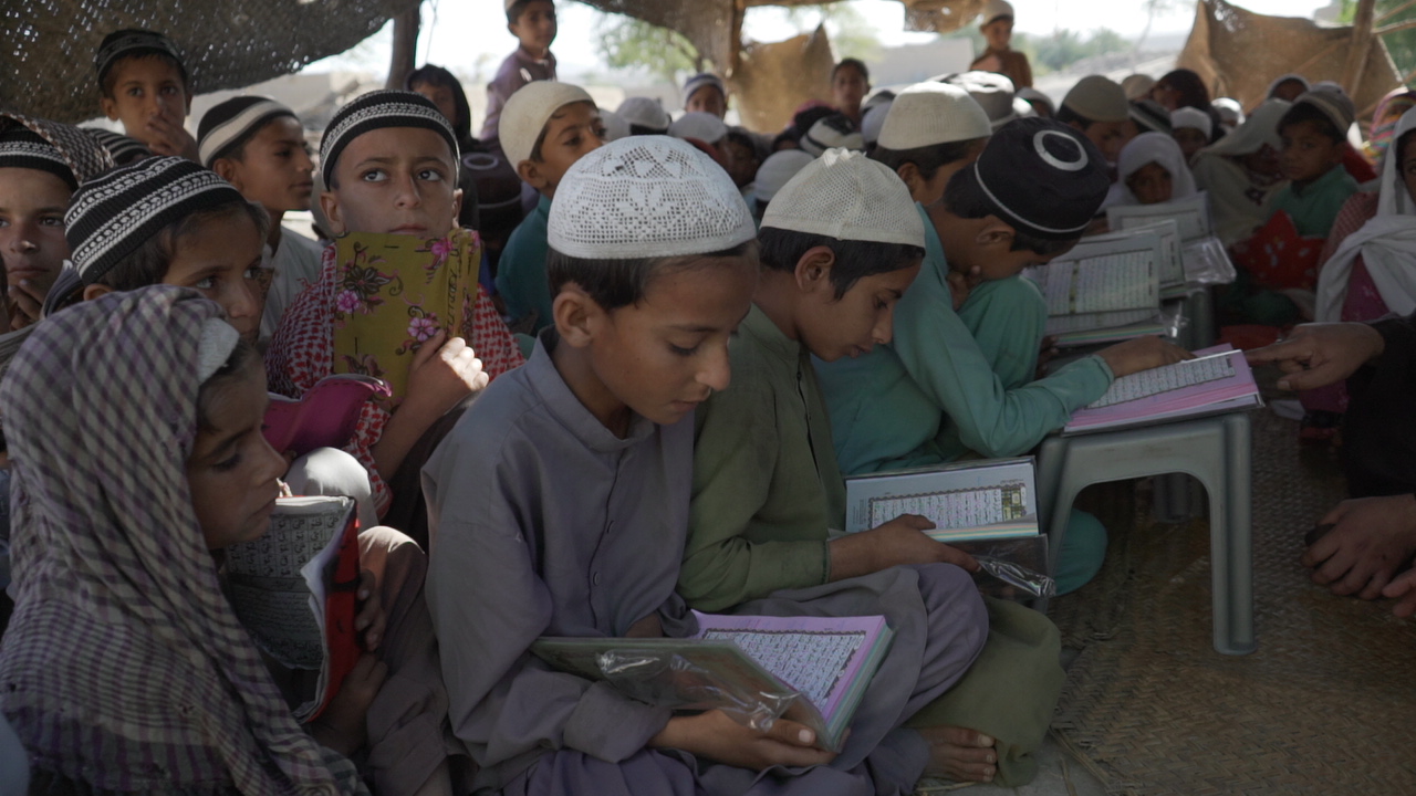 Child at water source